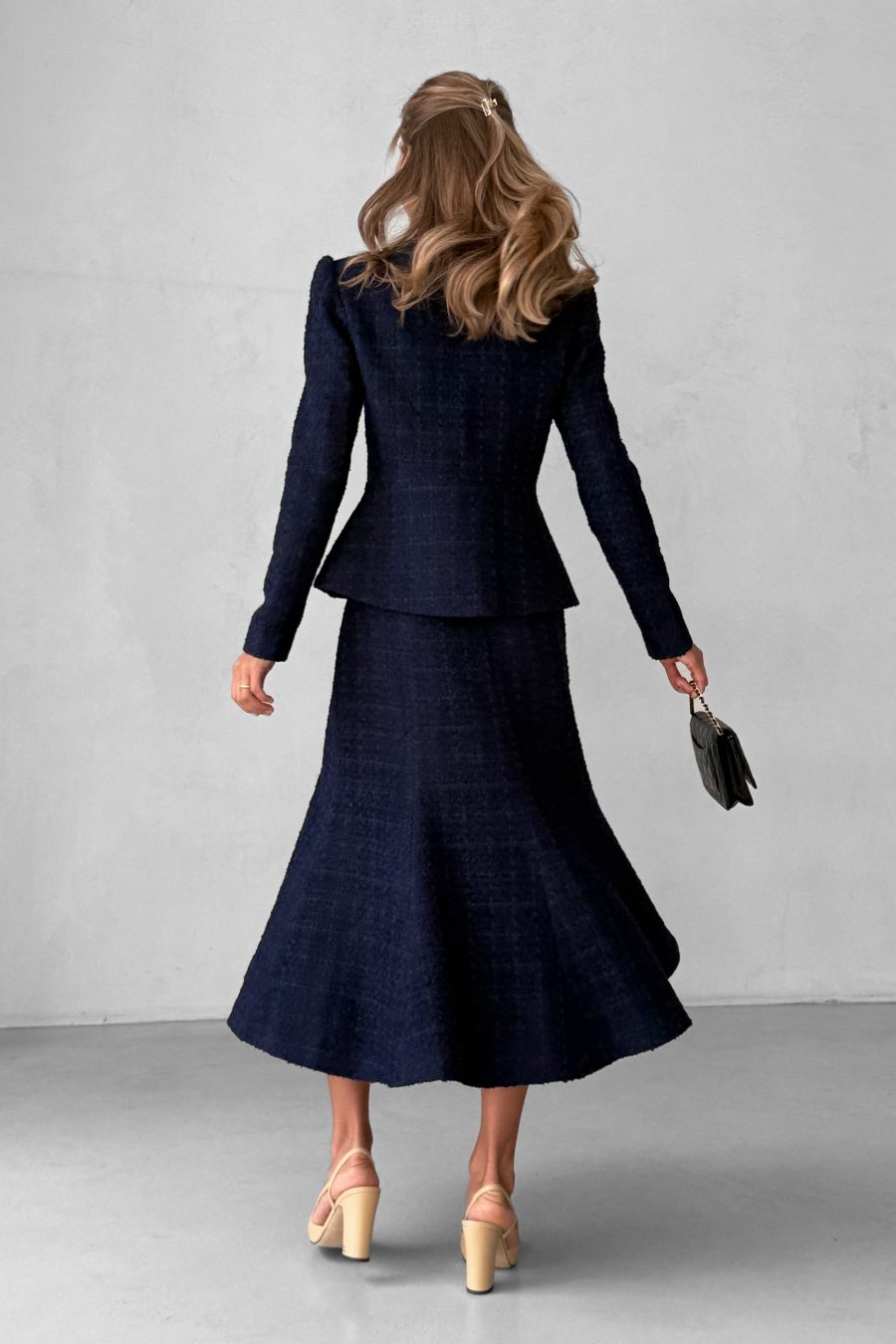 Tweed two-piece suit: asymmetrical jacket and godet skirt