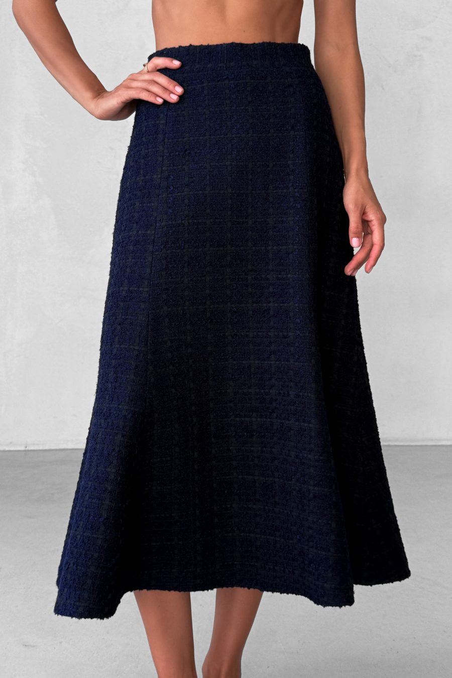 Tweed two-piece suit: asymmetrical jacket and godet skirt